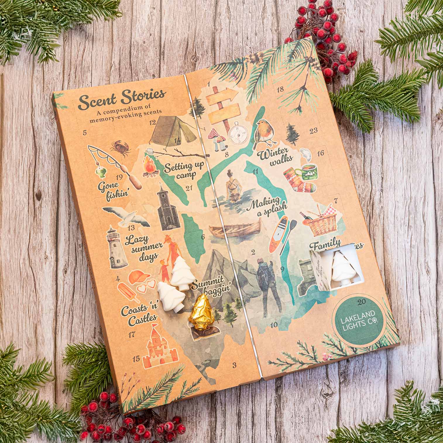 Lakeland Lights Company's 2024 Soy Wax Melt Advent Calendar in a Festive scene shown with its bespoke design and colourful luxury packaging